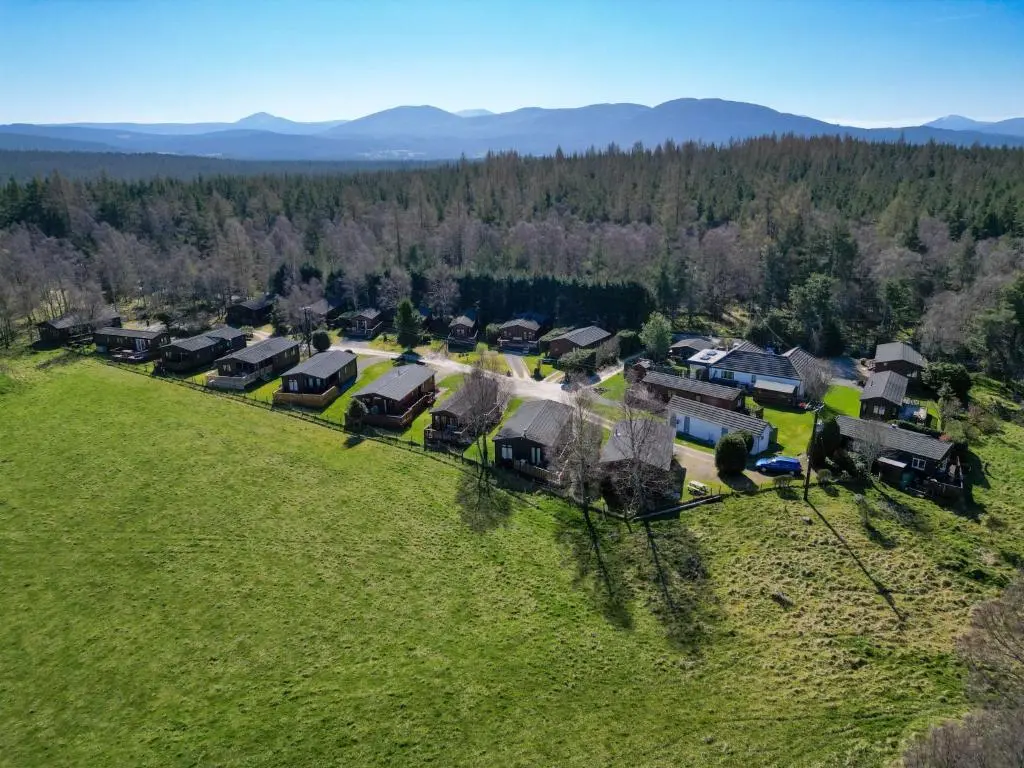 an aerial view of a group of homes in a field at Chalet Lodge 8 by Interhome in Boat of Garten
