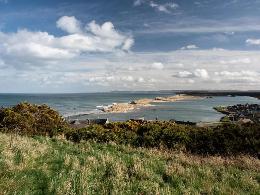 a view of a body of water with houses and buildings at Apartment Shore Street by Interhome in Lossiemouth