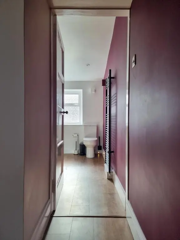 an empty hallway with a toilet in a room at West Lodge, High Street in Aberlour