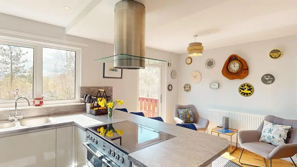 a kitchen with a sink and a counter top at Killiechangie House in Newtonmore
