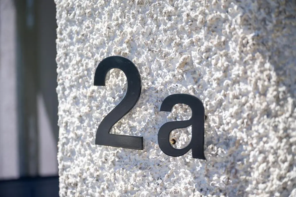 a number on the side of a stone at Firthview Fortrose in Fortrose