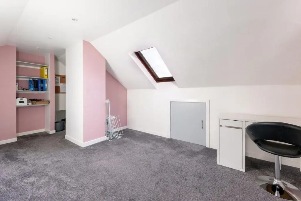 an empty room with a desk and a chair at THE KEMPS 7bed 6 bathroom PARKING for 3 vehicles Ideal for contractors Next to LIDLE part of Langleycottageandapartments portfolio REDUCTION FOR LONG STAYS in Inverness