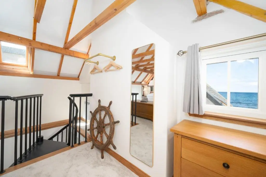 a room with a view of the ocean at Nautical Nook, 16 Seatown, Gardenstown in Gardenstown