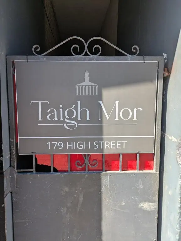 a sign for a high street on a wall at Taigh Mor in Elgin