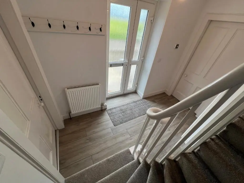 an image of a staircase in a house at 1 Links Place in Nairn