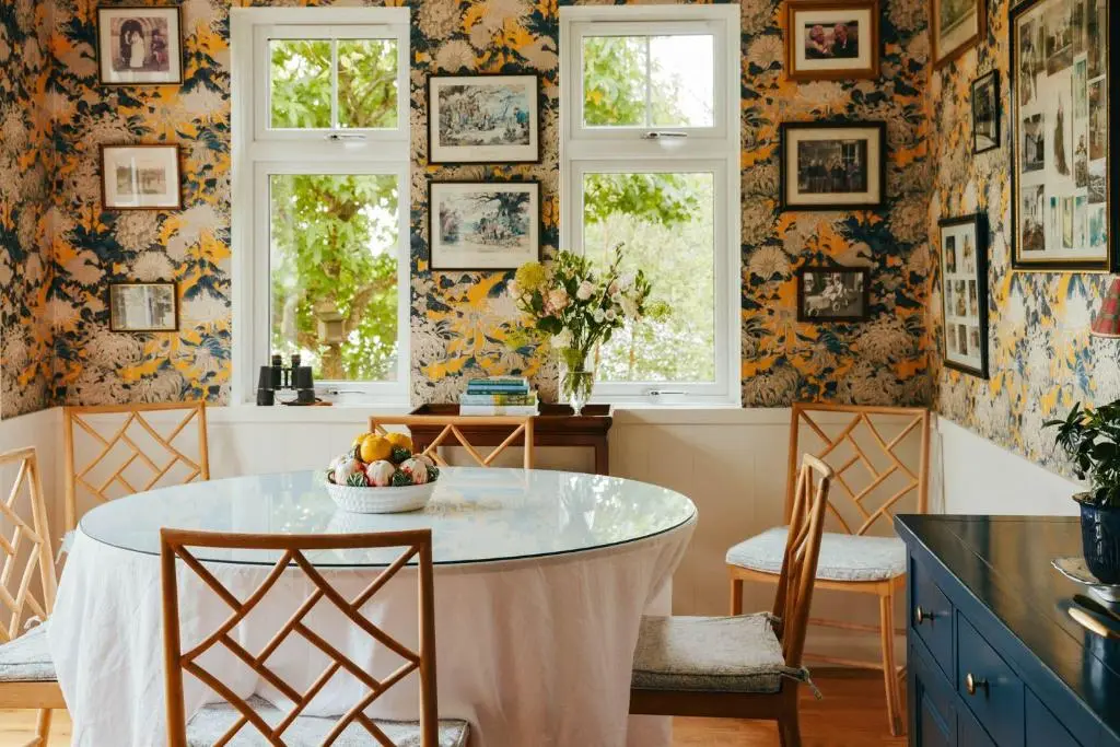 a kitchen with a table with a bowl of fruit on it at The Secret Loch in Lhanbryd