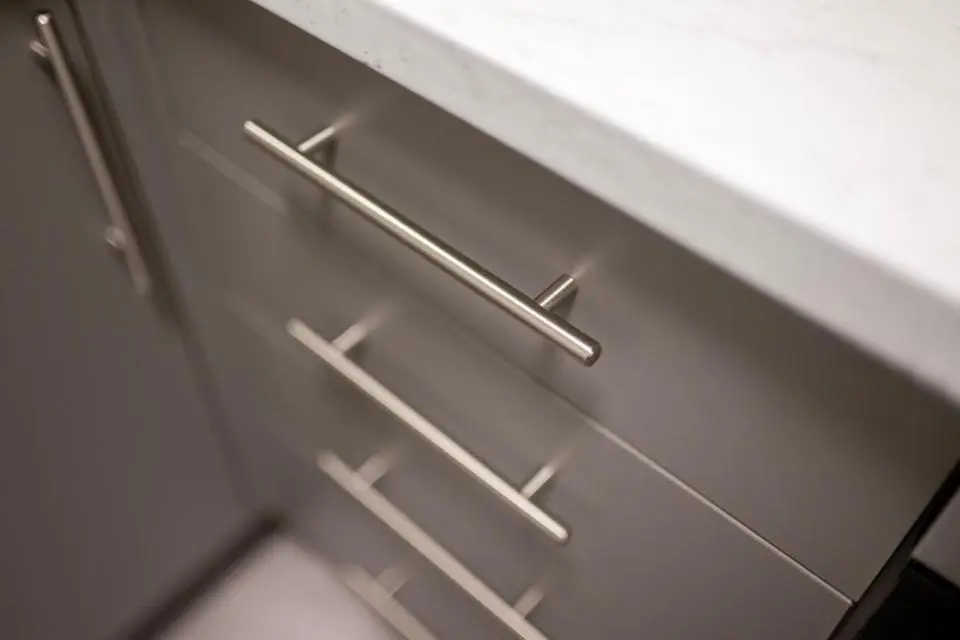 a kitchen drawer with metal handles on a counter at 1 BDR Apartment At Caledonia Luxe Stays Short Lets & Serviced Accommodation Inverness in Inverness