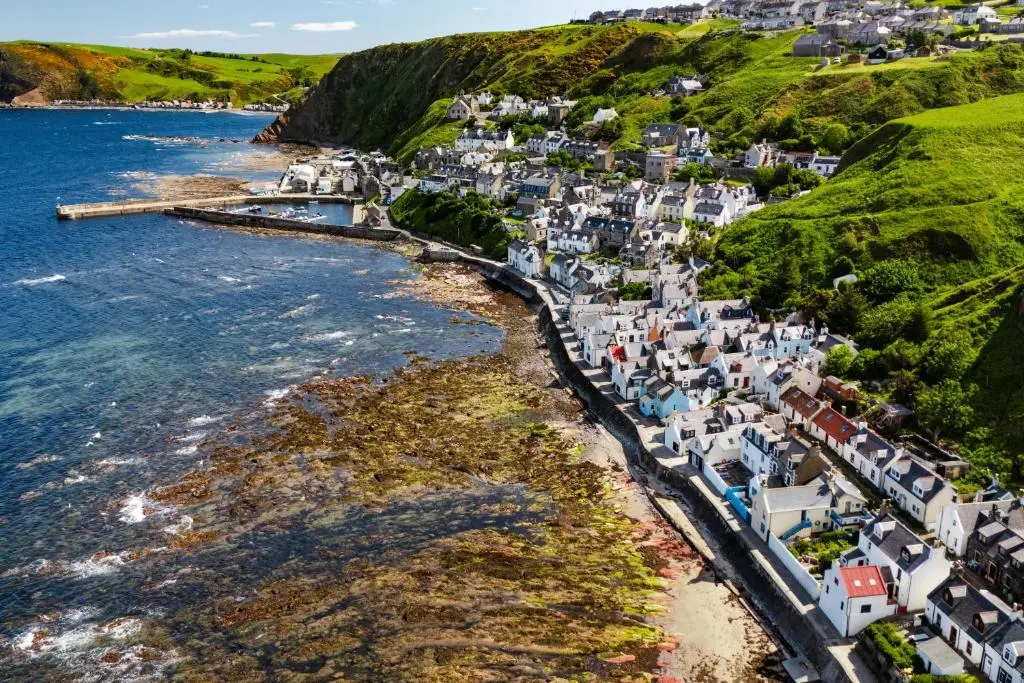an aerial view of a village on the coast at Soundwaves, Seatown, Gardenstown in Gardenstown