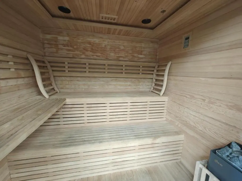 a large wooden sauna with wooden floors and ceilings at 1 Bed in Newtonmore oc-c32414 in Newtonmore
