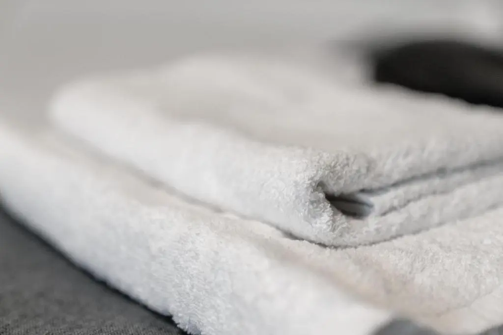 a close up of a pile of white towels at 2 Bedroom Inverness Apartment - Perfect Location in Inverness