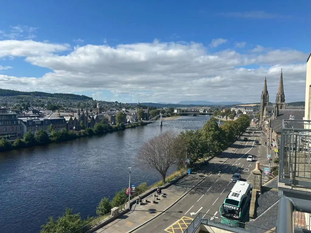 a view of a river in a city at V\u016b by the Bridge, Inverness City Centre in Inverness