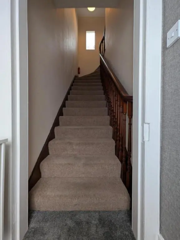 a staircase in a home with a stair case at Foggiehoose based near Turriff Huntly Banff in Aberchirder