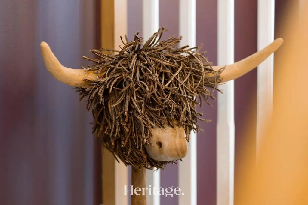 a hedgehog head with horns attached to a door at Bonnieview House, Tarves, Aberdeenshire