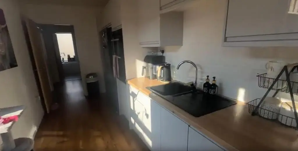 a kitchen with a sink and a counter top at White Crystal in Invergordon