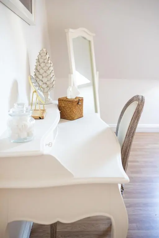 a white desk with a mirror and a chair at Lillymont Apartment - Inverness City Centre in Inverness