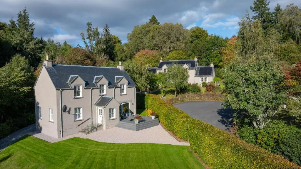an aerial view of a house with a driveway at Glen Tilt House in Bridge of Tilt