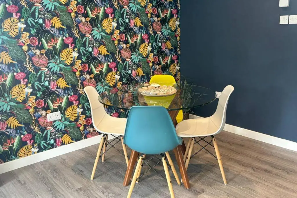 a dining room with a table and two chairs at The Burghead Hideaway in Burghead