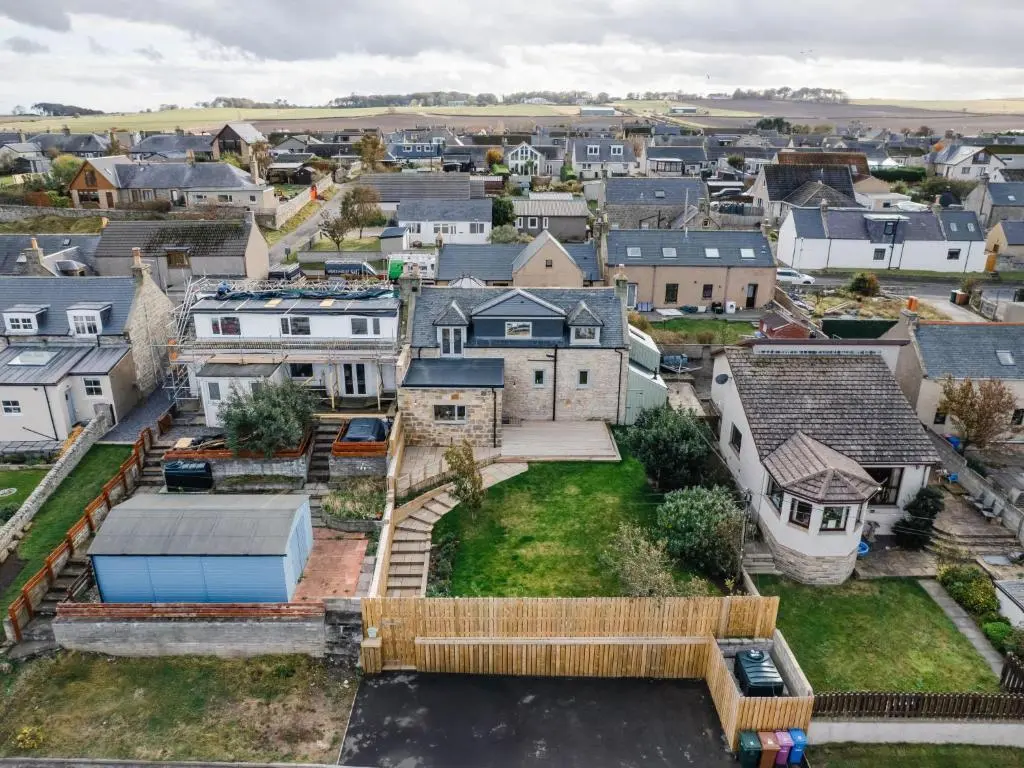 an aerial view of a town with houses at Holiday Home Cooriedoon by Interhome in Hopeman