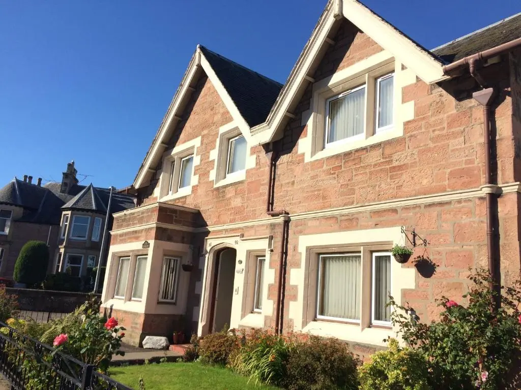 a brick house with a front yard at Atherstone B&B in Inverness