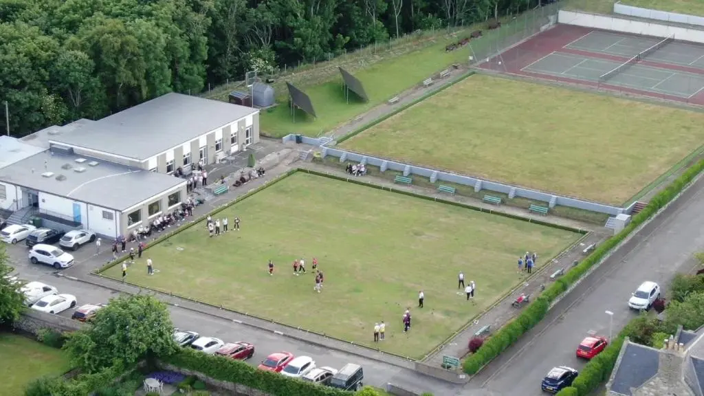 an aerial view of a building with a tennis court at Serenity by the Sea in Buckie