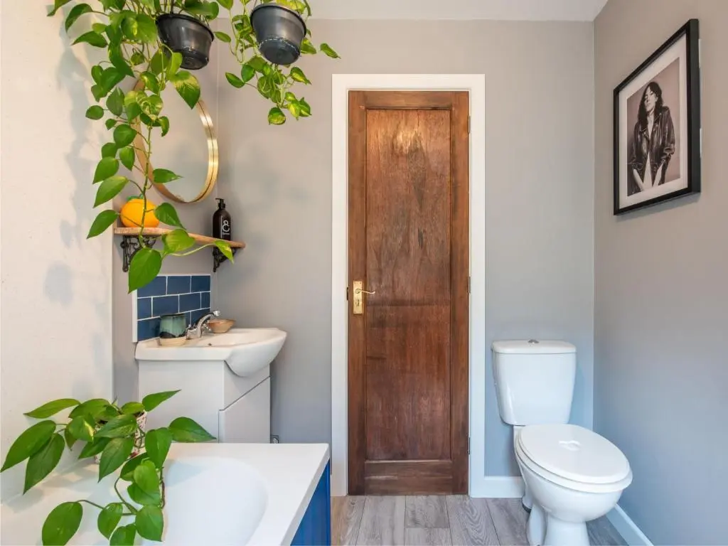 a bathroom with a toilet and a sink at Chalet The Cabin by Interhome in Eskadale