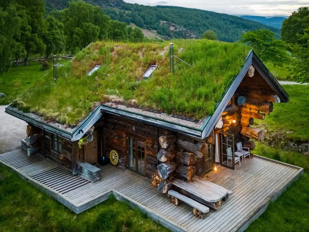 an image of a log cabin with a grass roof at Sylvia - Uk50065 in Struy