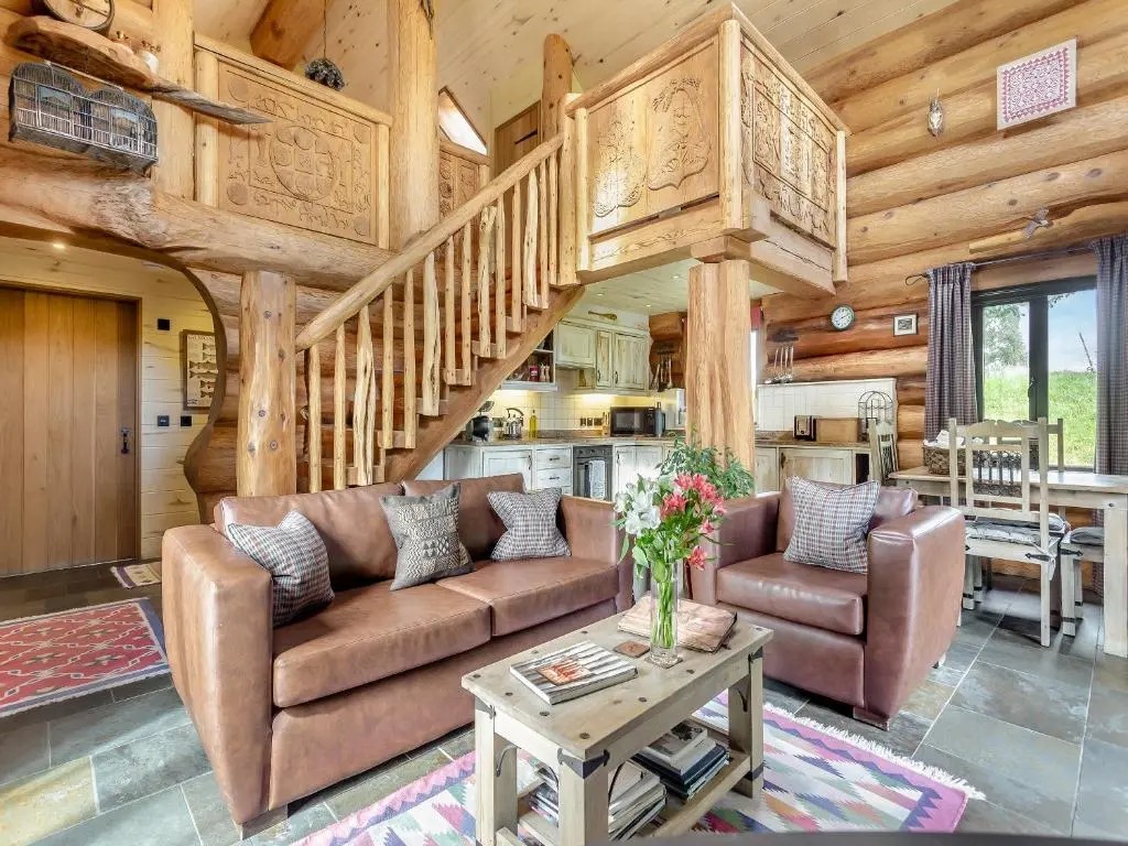 a living room with a couch and a table at Sylvia - Uk50065 in Struy