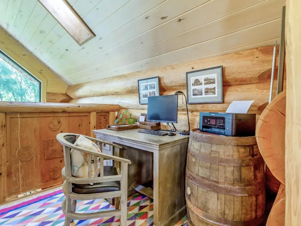 a room with a desk with a computer and a chair at Parus - Uk50083 in Beauly