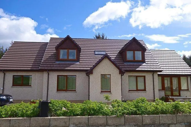 a house with a gambrel roof on top of it at 3 Bed in Drybridge oc-w34891