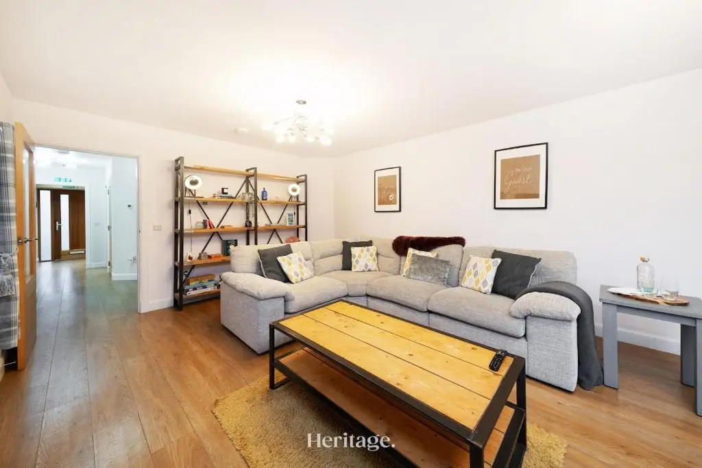 a living room with a couch and a coffee table at The Steading Family Friendly Getaway in Peterhead