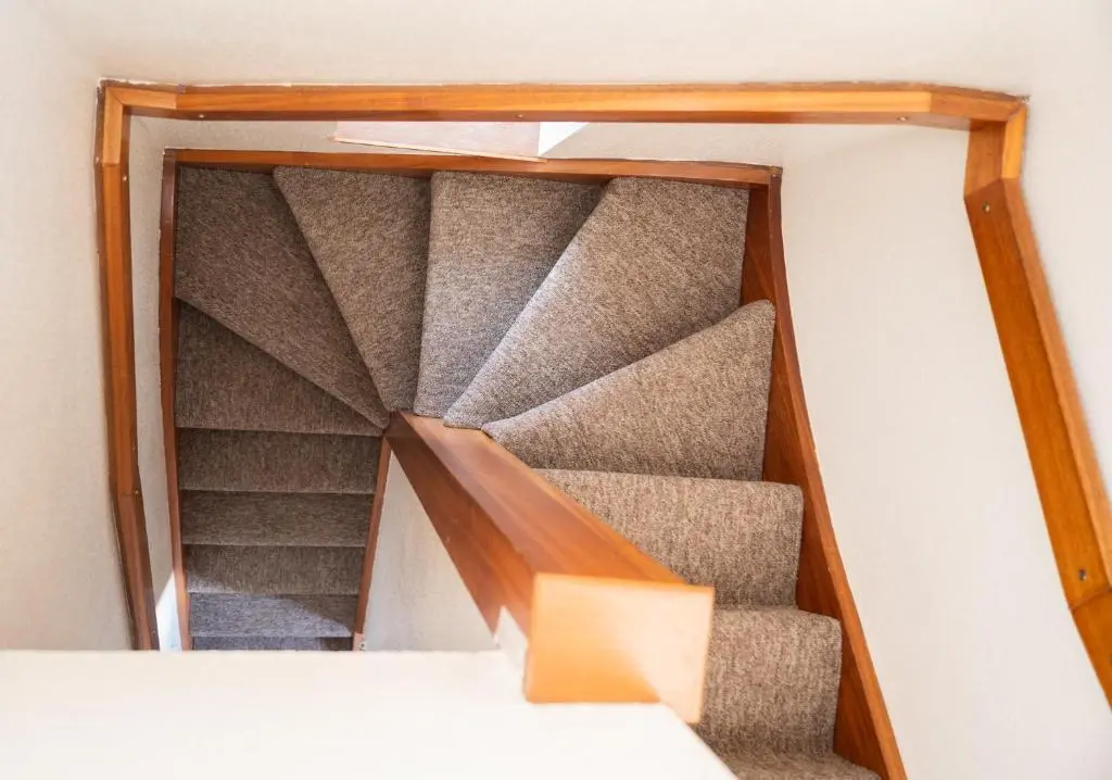 an empty stair case in a room with stairs at Elgin Self Catering Holiday Cottage in Elgin