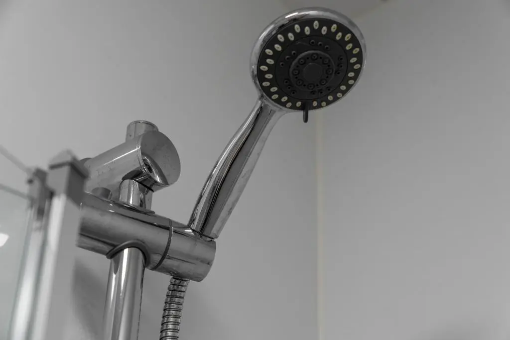 a shower head with a hose at mySTAYINN Strathblane House in Inverness
