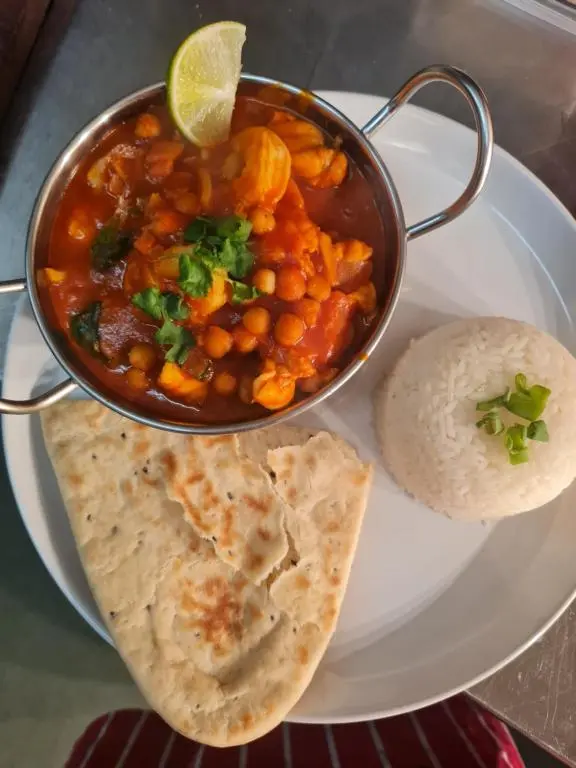 a pot of stew with a tortilla and a bowl of food at Victoria Hotel in Portknockie