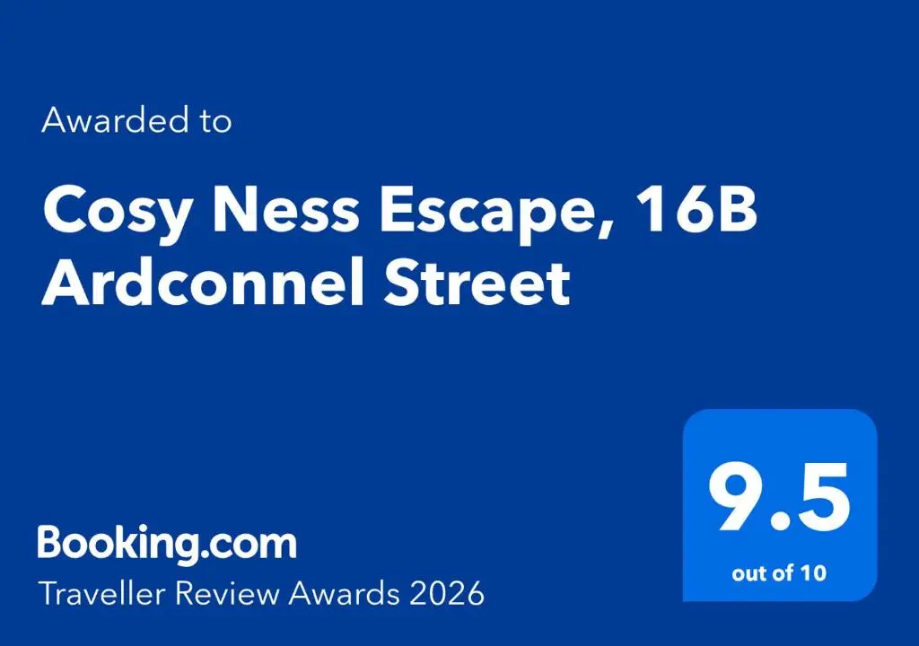 a blue sign with the words crossey nest escape adom at Cosy Ness Escape, 16B Ardconnel Street in Inverness