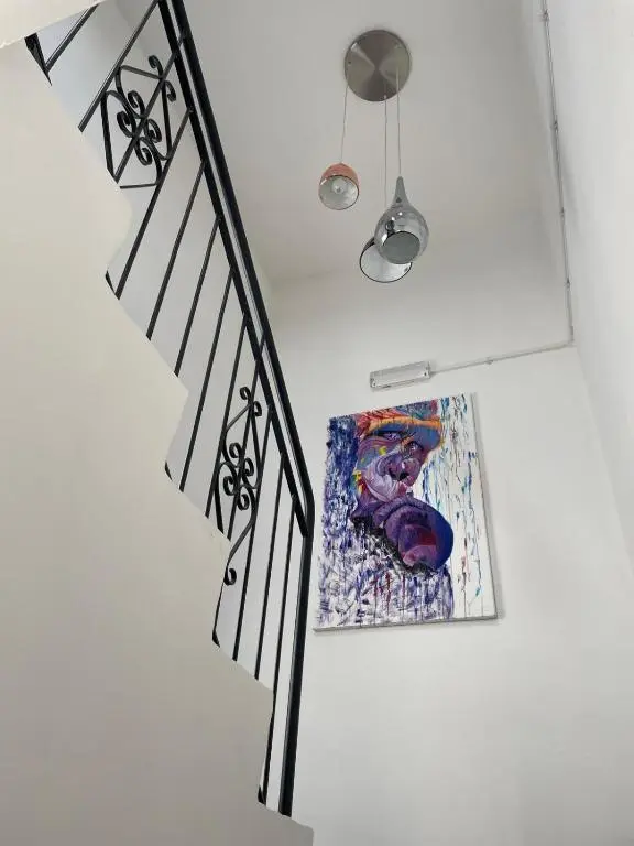 a painting on the wall next to a painting on a wall at Crannach House bed and breakfast and self catering apartments in Ballater