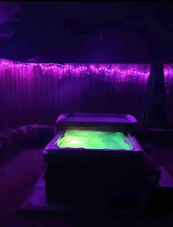 a dark room with purple lights and a mattress at Bankhead Accommodation Aberdeenshire in Gamrie