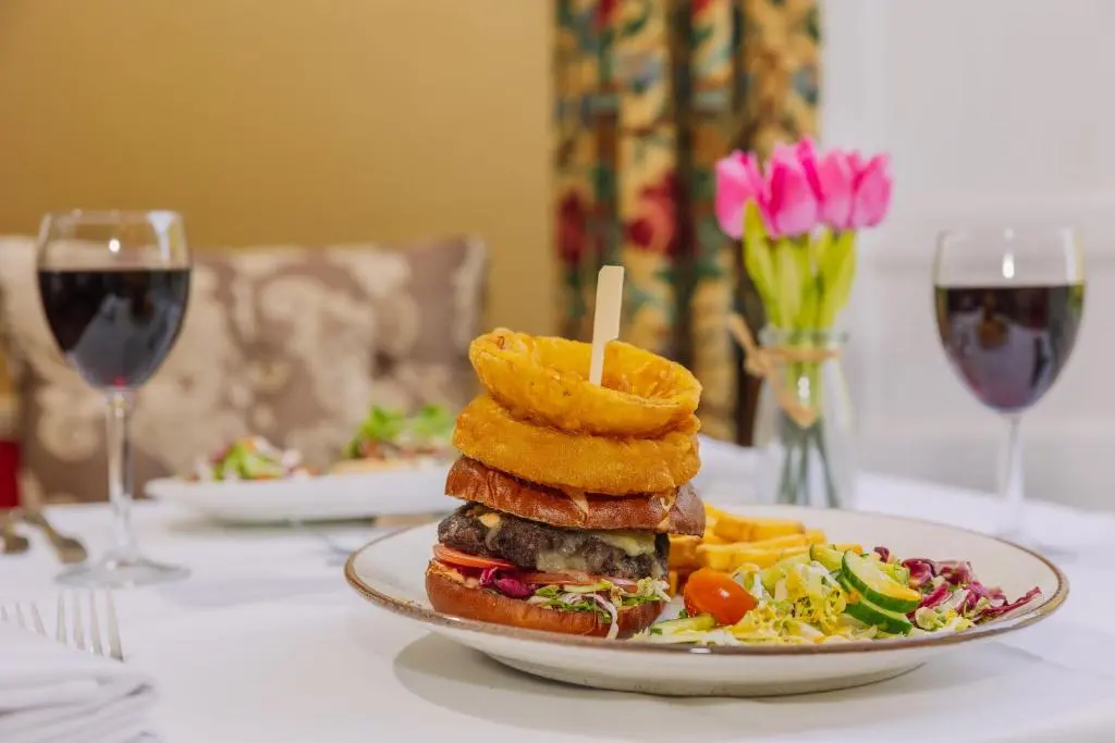 a plate of food with a sandwich and french fries at Muthu Newton Hotel (Near Inverness Airport) in Nairn