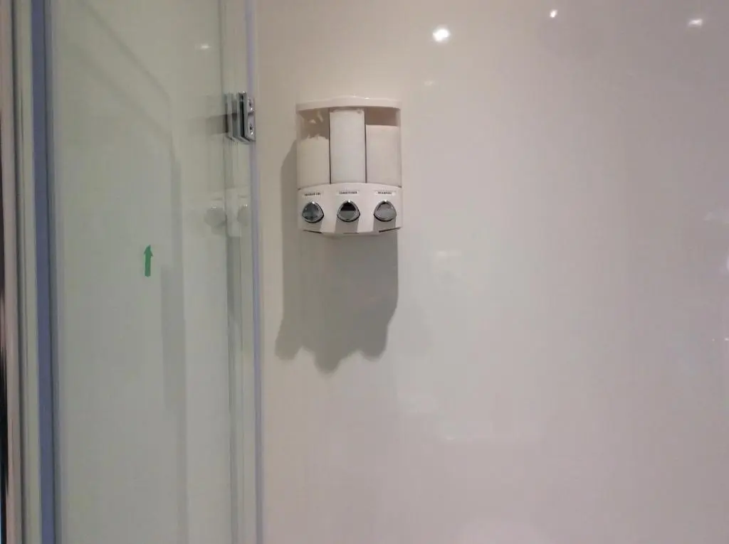 a bathroom with two rolls of toilet paper on the wall at Rudan Guest House AB53 6UQ in New Deer