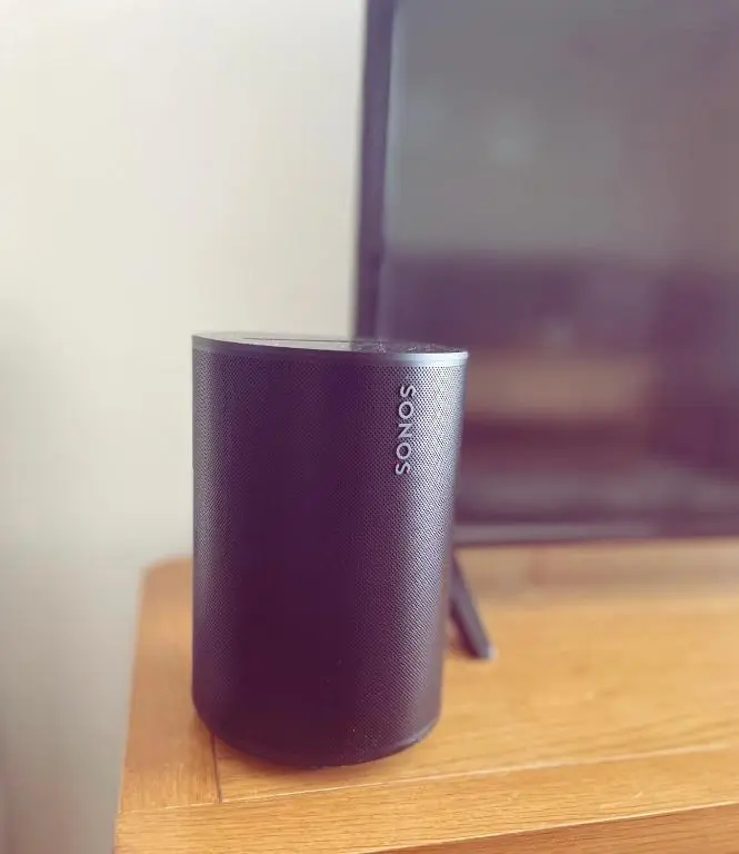 a black coffee cup sitting on a wooden table at Malva - Modern 2 Bedroom Bungalow in Wick Sleeps 4 with private parking - NC500 Route in Wick