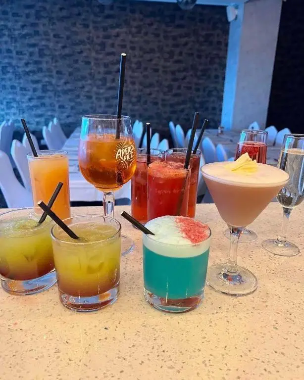 a table topped with four different types of drinks at The Knowes Hotel & Restaurant in Macduff