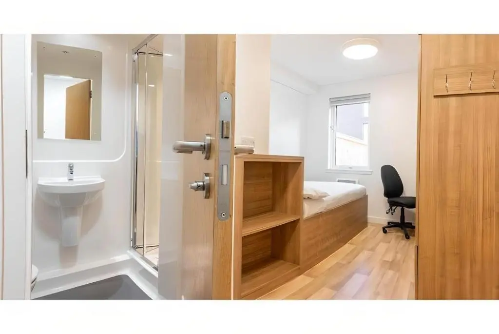 a bathroom with a shower and a toilet and a sink at UHI Dornoch- Campus Accommodation in Dornoch