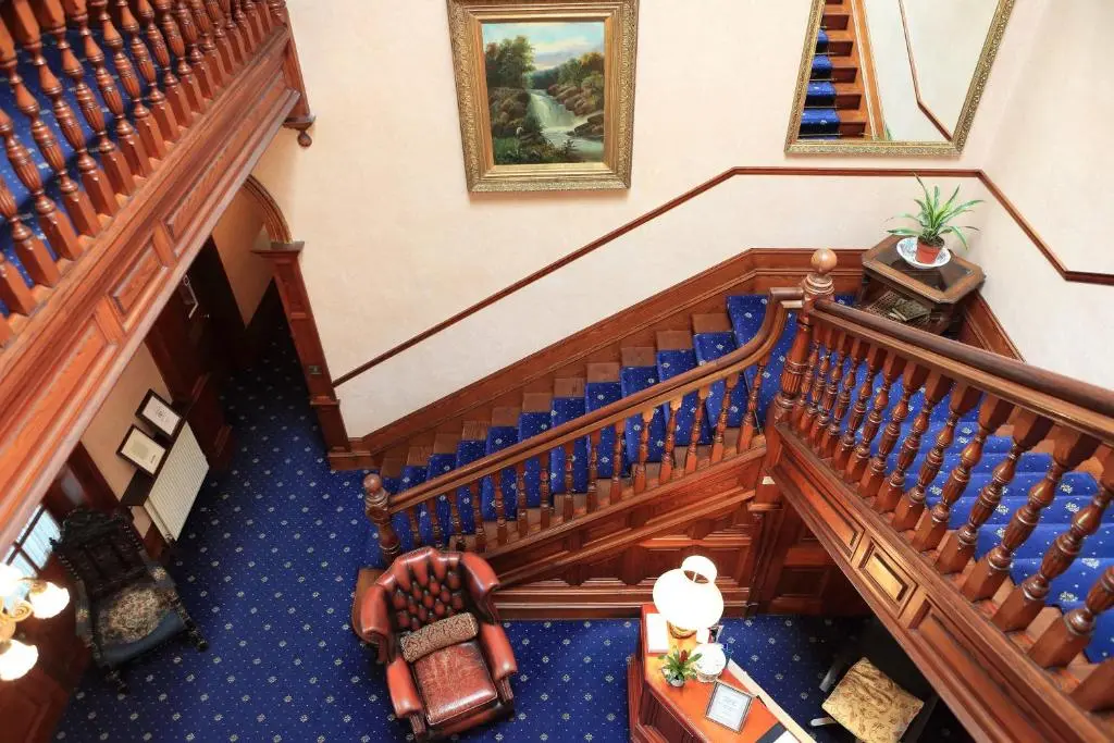 an overhead view of a staircase in a building at Ramnee Hotel in Forres