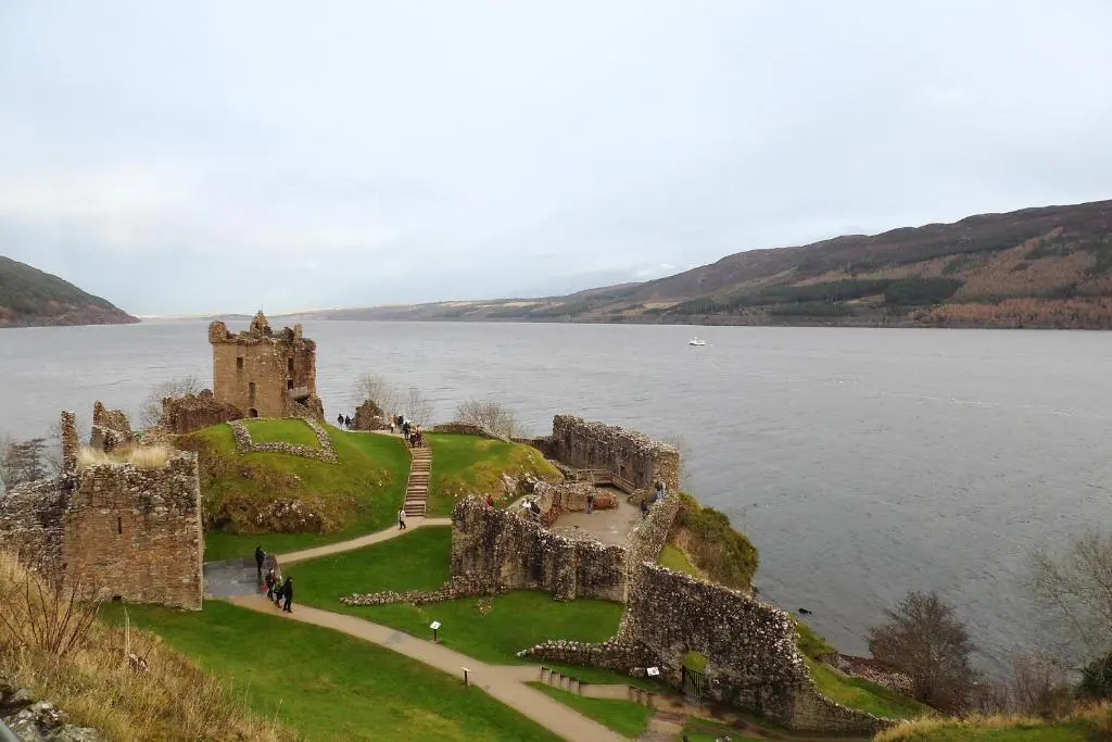 a castle on the edge of a body of water at Torridon Guest House in Inverness