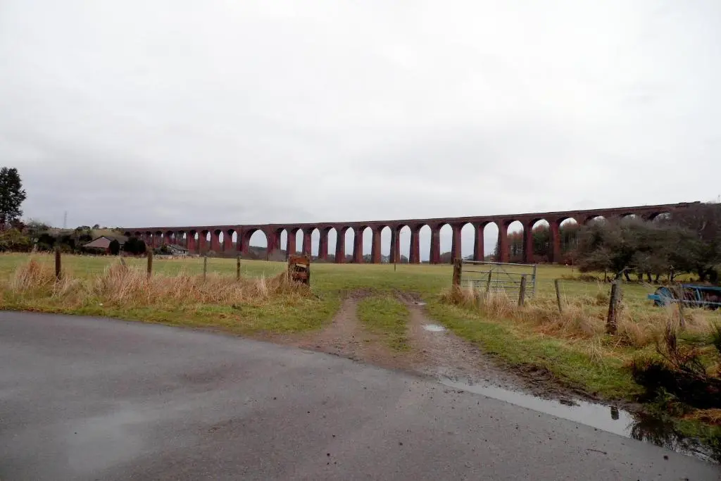 a large bridge in the distance with a road at Torridon Guest House in Inverness