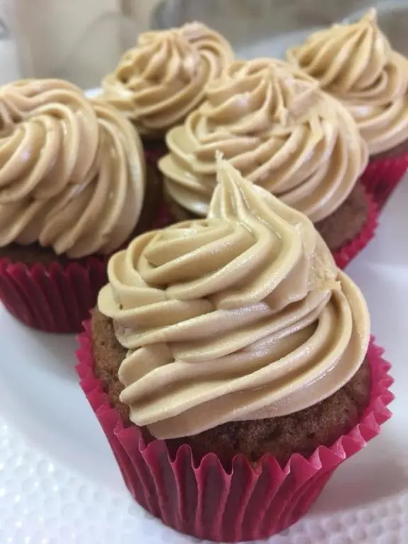 a group of cupcakes with cream cheese frosting at The Royal Oak Hotel in Cullen