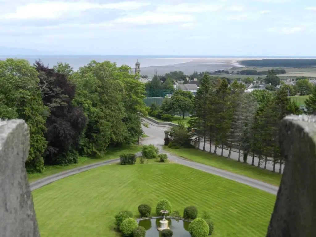 an aerial view of a park with a fountain at Mansfield Castle Hotel in Tain