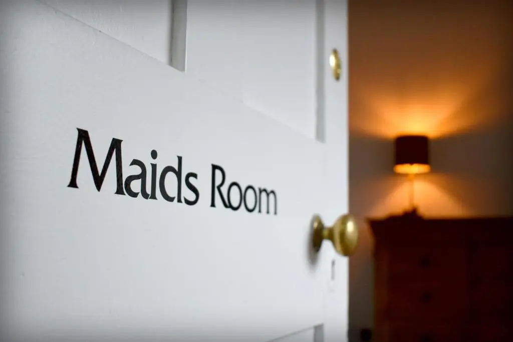 a white door with the words wizards room on it at The \u2018Servants Quarters@Delny House\u2019 in Invergordon