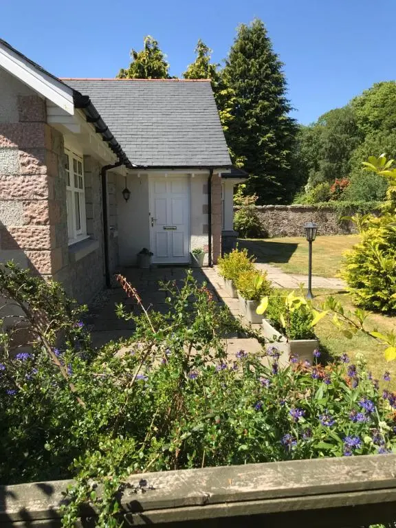 a garden in front of a house at Westwood Cottage in Aboyne
