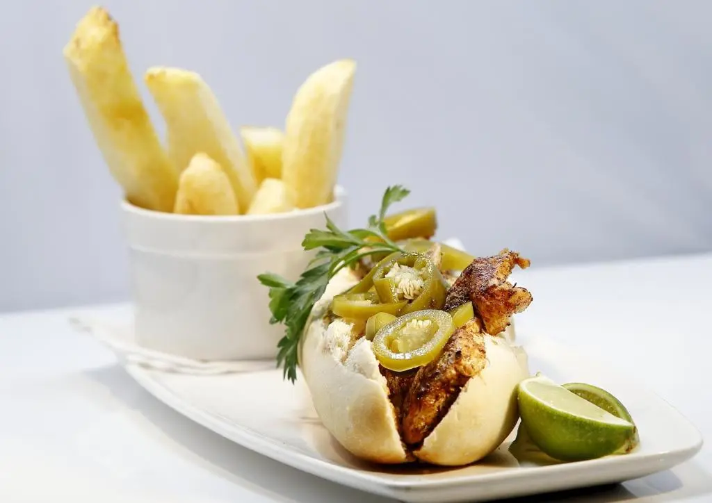 a plate of food with a sandwich and french fries at Invergarry Hotel in Invergarry