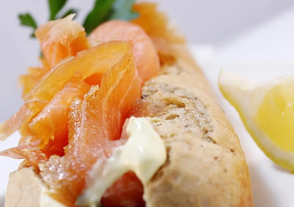 a sandwich with oranges and cheese on a plate at Invergarry Hotel in Invergarry